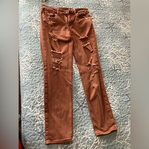 American Eagle woman size 4 (28-28)Tom Girl distressed super stretch jeans